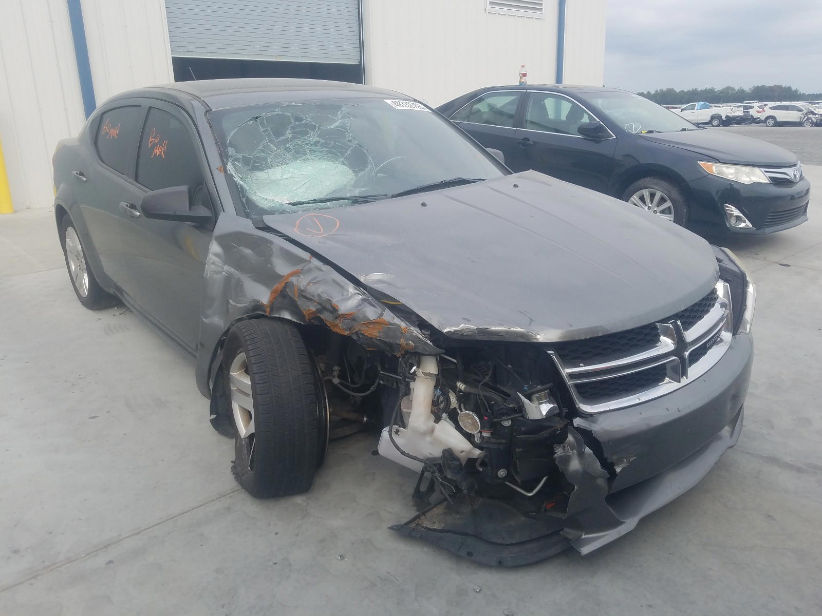 DODGE AVENGER SE 2013 with VIN 1C3CDZAB5DN669027 - Photo from auction