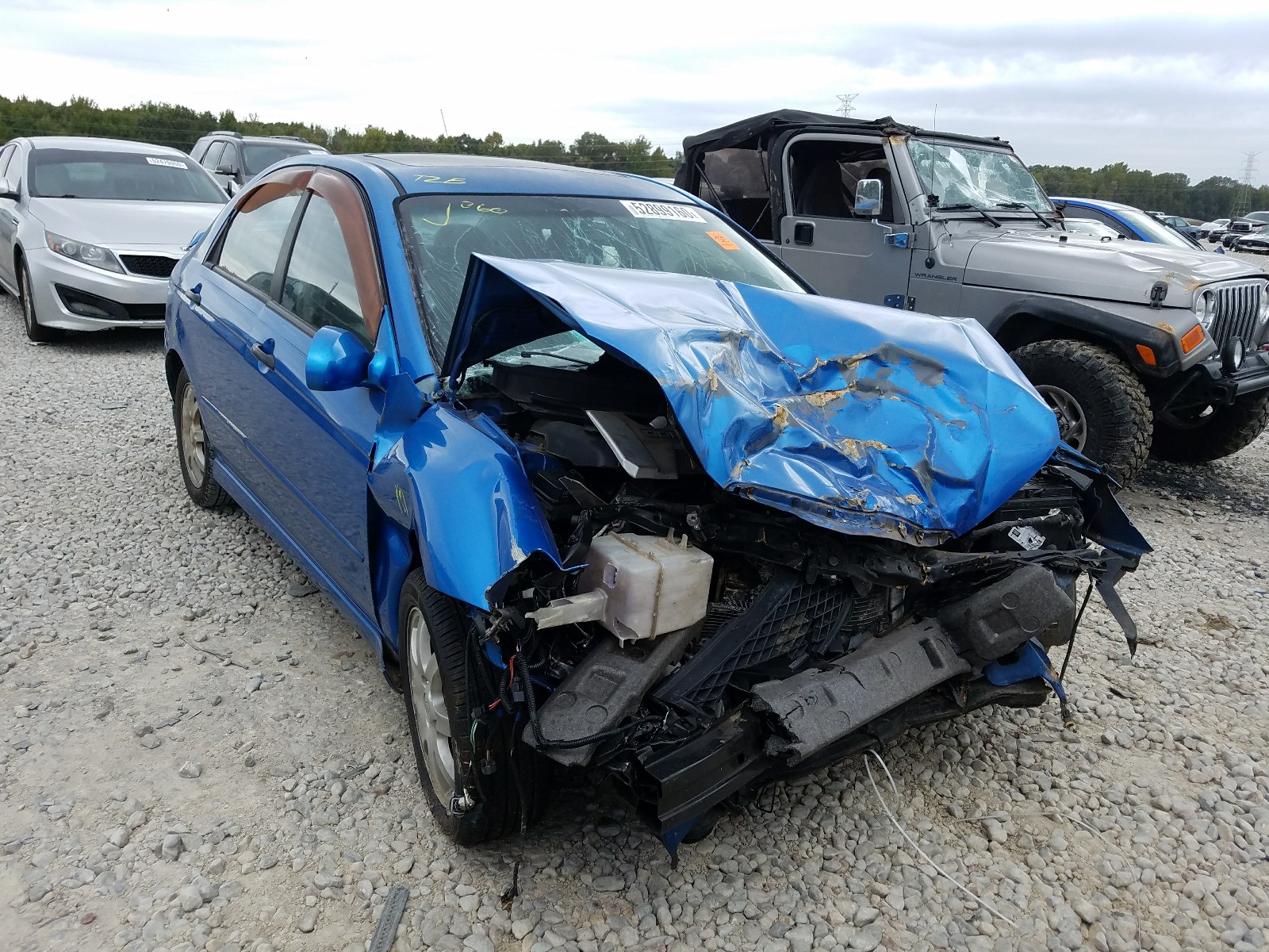 Photo 11 from auction – 2006 KIA SPECTRA LX with VIN KNAFE121365373422