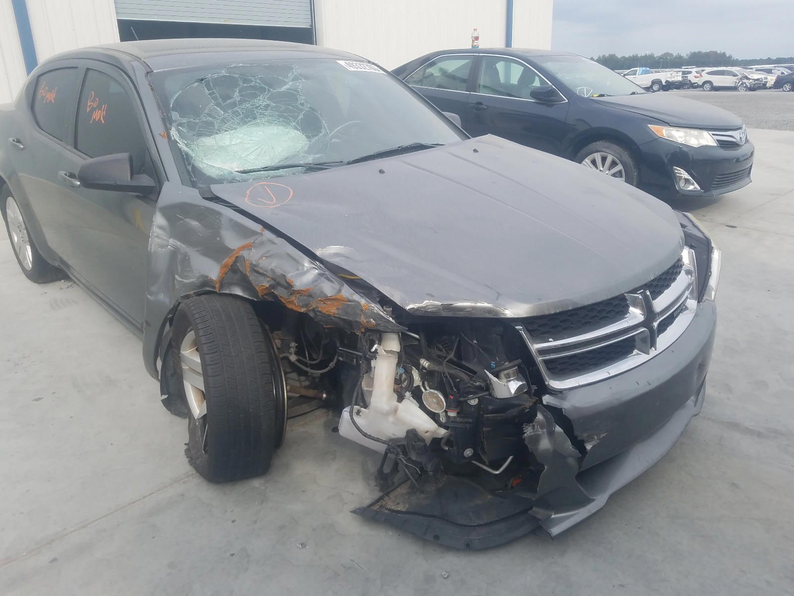 Photo 9 from auction – 2013 DODGE AVENGER SE with VIN 1C3CDZAB5DN669027