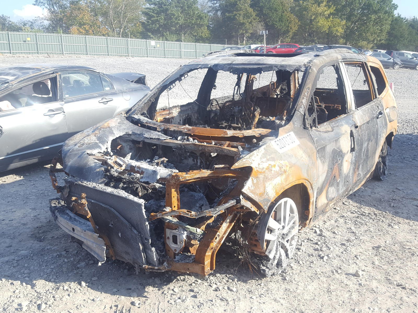 Photo 2 from auction – 2016 HONDA PILOT ELIT with VIN 5FNYF6H00GB115282