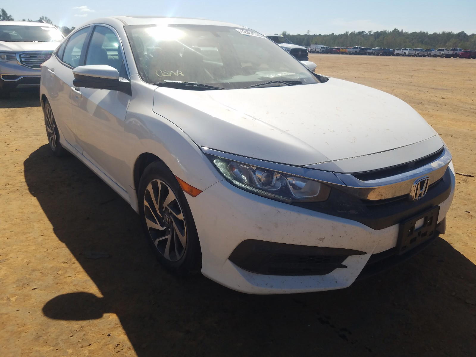 HONDA CIVIC EX 2016 with VIN 2HGFC2F74GH546910 - Photo from auction