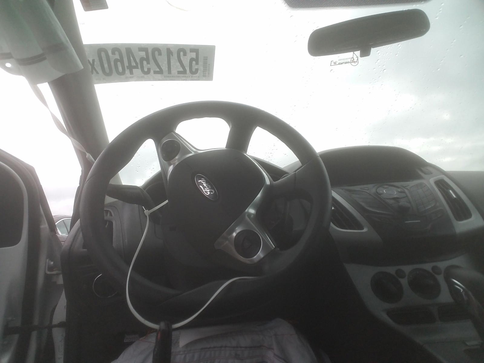 Photo 9 from auction – 2014 FORD FOCUS SE with VIN 1FADP3K29EL322791