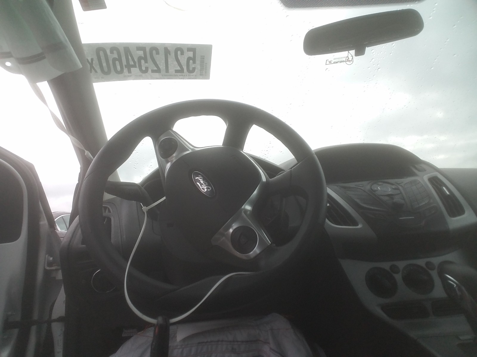 Foto 9 de la subasta – 2014 FORD FOCUS SE con VIN 1FADP3K29EL322791
