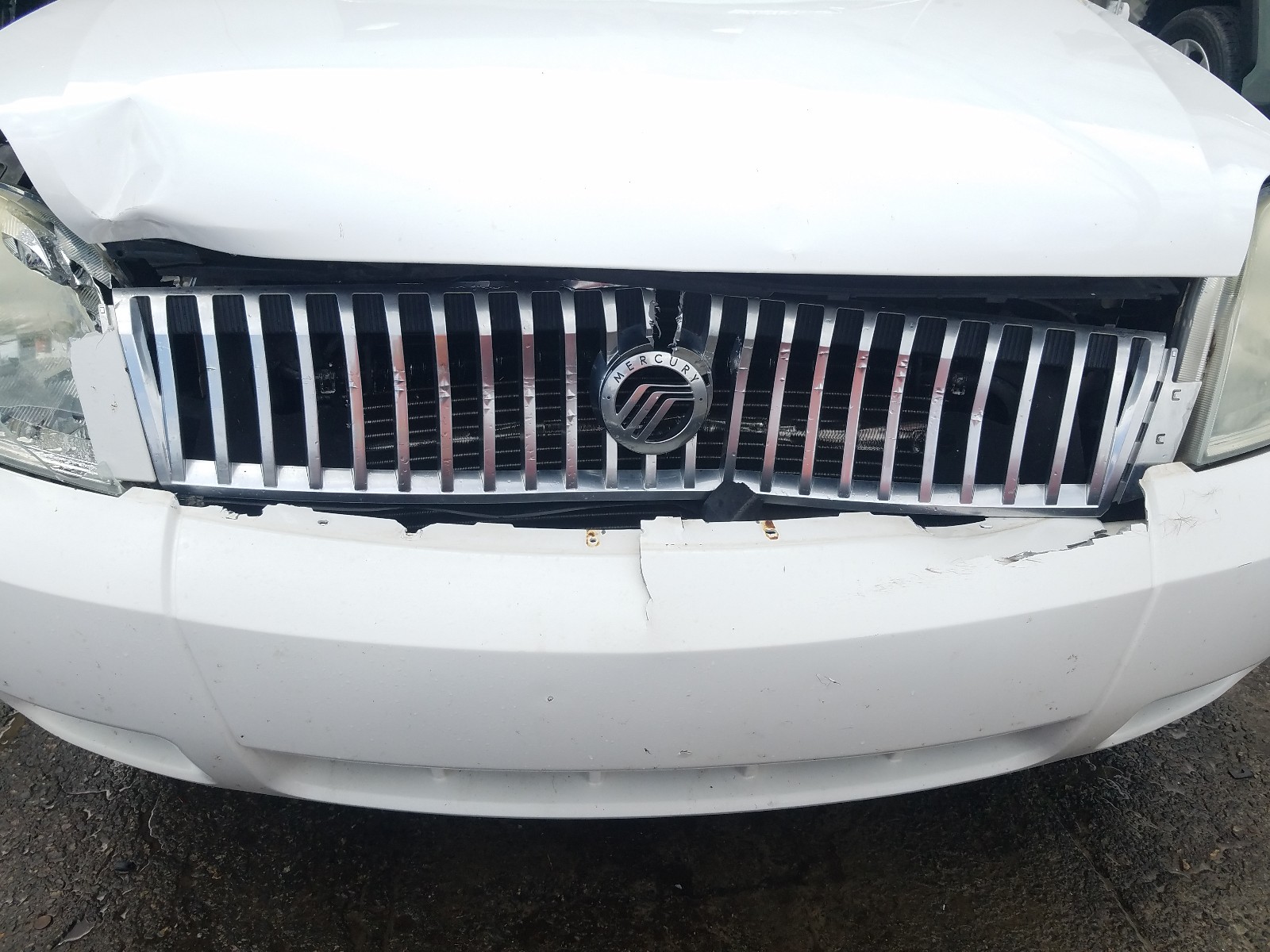 Photo 9 from auction – 2005 MERCURY MONTEGO PR with VIN 1MEFM42185G620829