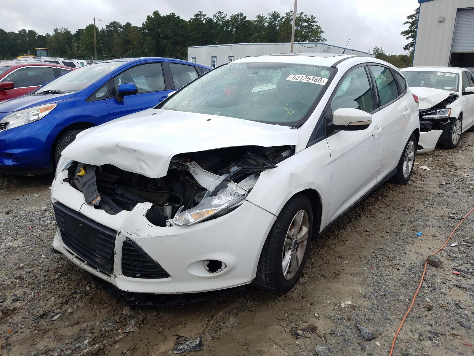 Photo 2 from auction – 2014 FORD FOCUS SE with VIN 1FADP3K29EL322791