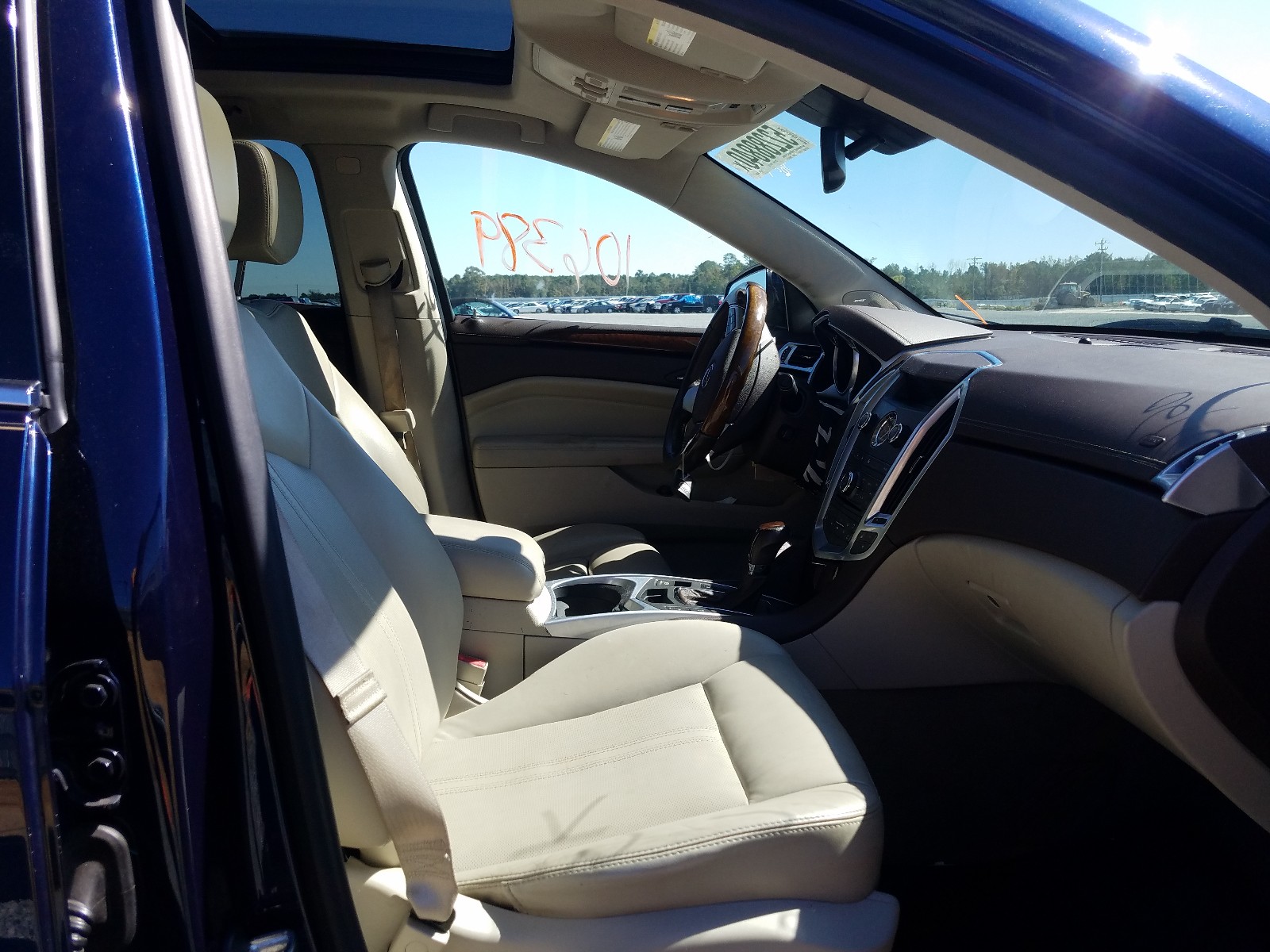Photo 5 from auction – 2011 CADILLAC SRX LUXURY with VIN 3GYFNAEY2BS575092