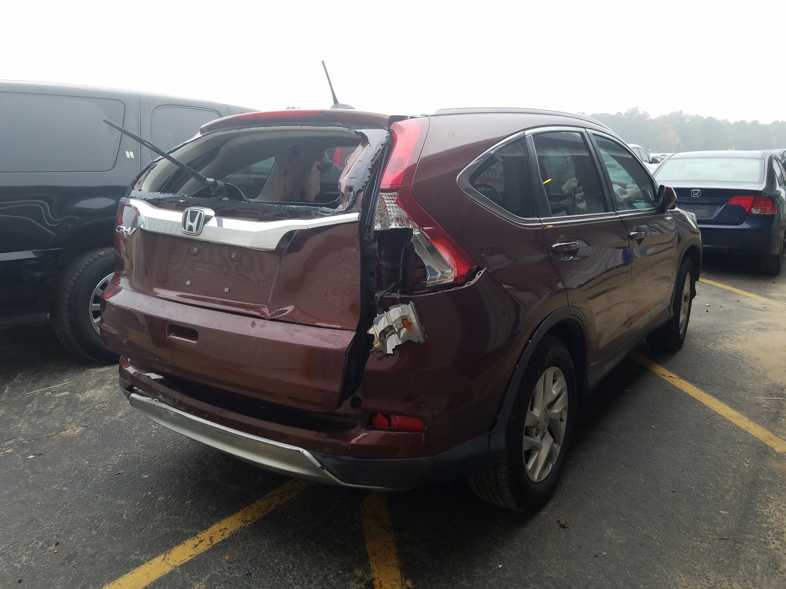 Photo 4 from auction – 2015 HONDA CR-V EXL with VIN 2HKRM3H76FH510623
