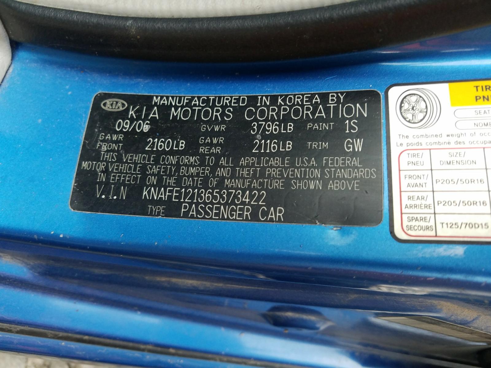 Photo 20 from auction – 2006 KIA SPECTRA LX with VIN KNAFE121365373422