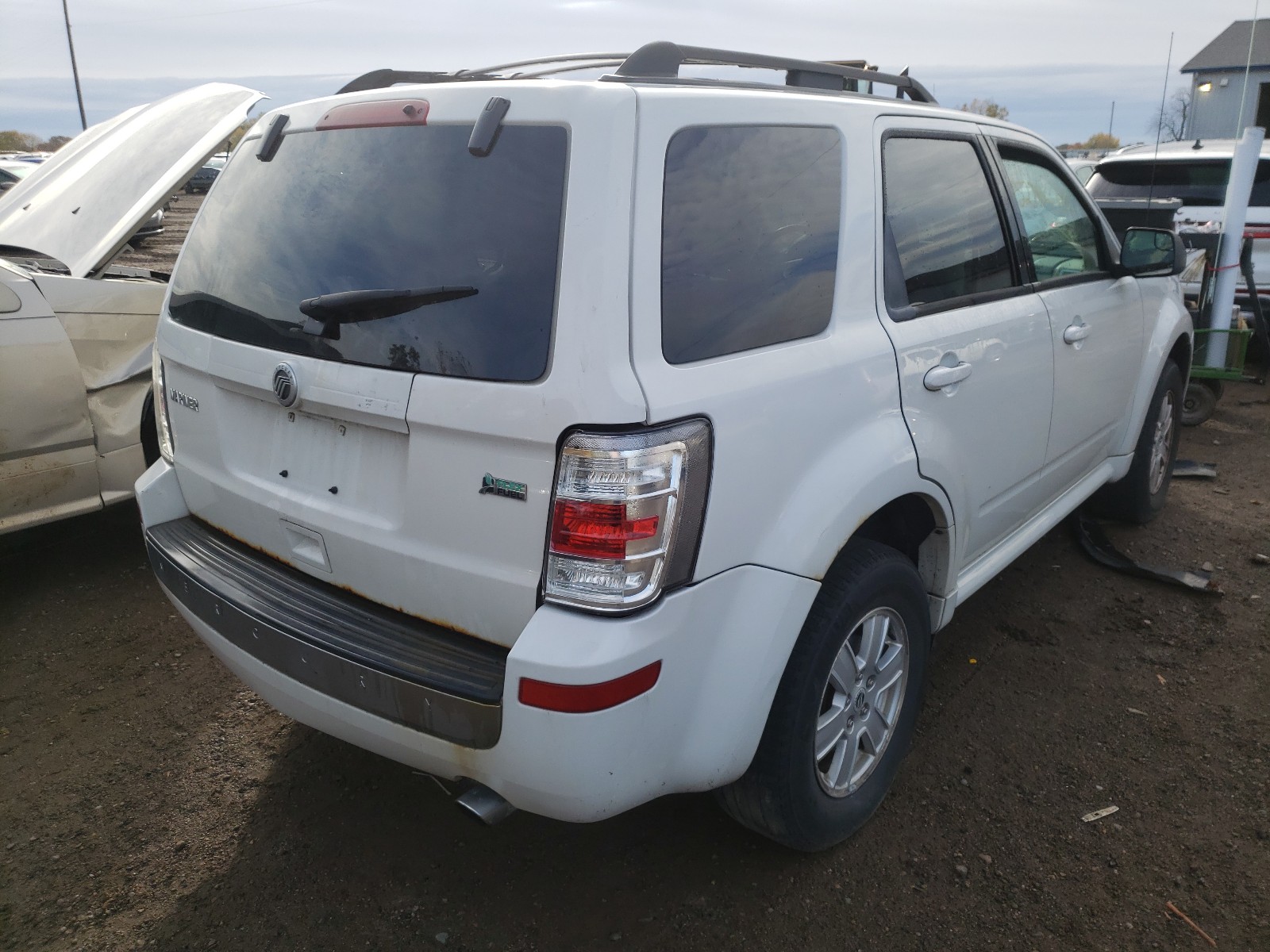 Photo 4 from auction – 2010 MERCURY MARINER with VIN 4M2CN9BG9AKJ17329