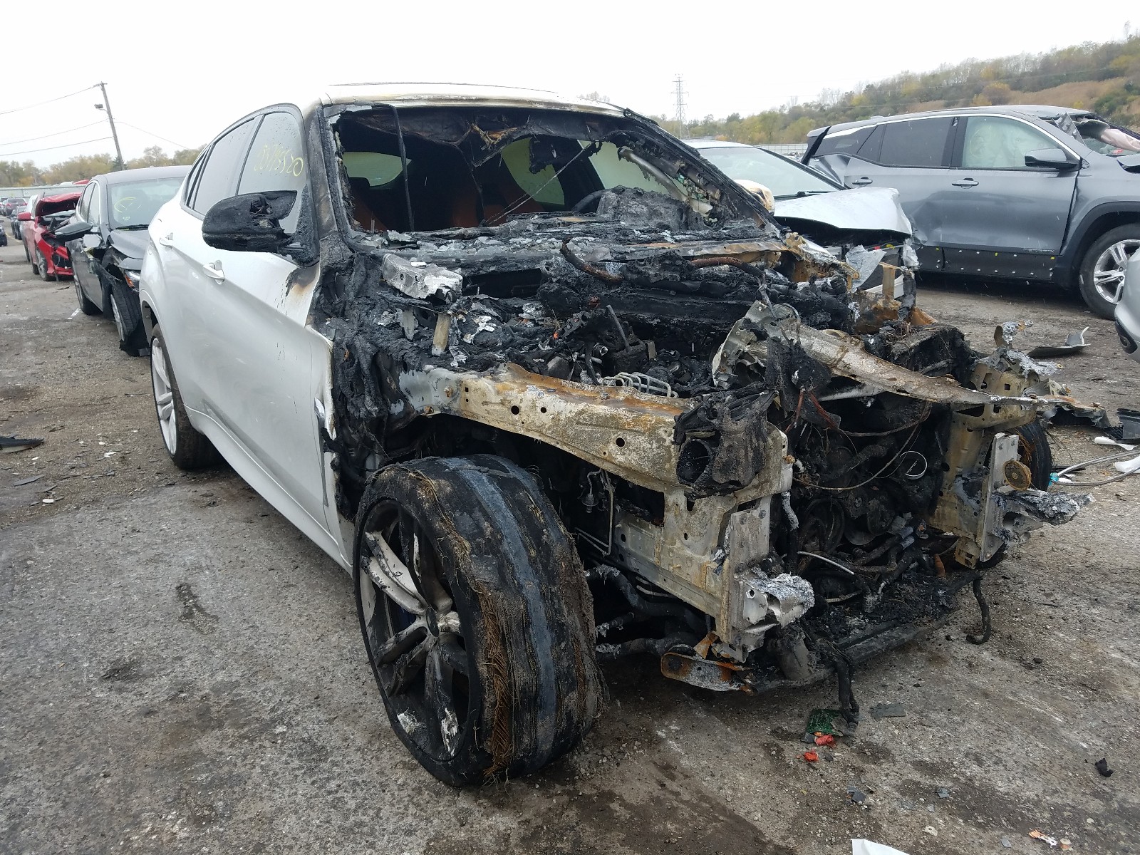 BMW X6 M 2019 with VIN 5YMKW8C5XK0Y74976 - Photo from auction