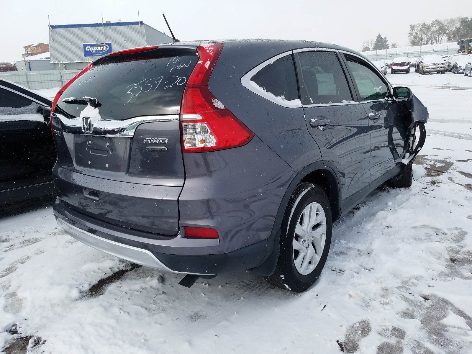 Photo 4 from auction – 2016 HONDA CR-V EX with VIN 2HKRM4H58GH725197