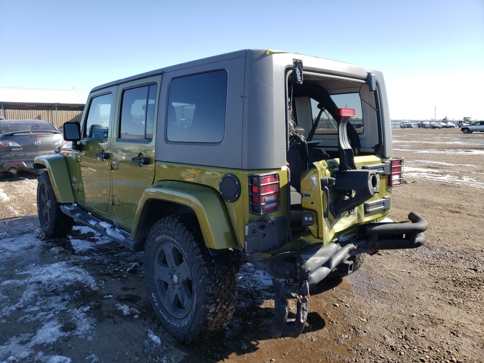 Photo 3 from auction – 2010 JEEP WRANGLER U with VIN 1J4BA5H16AL214209