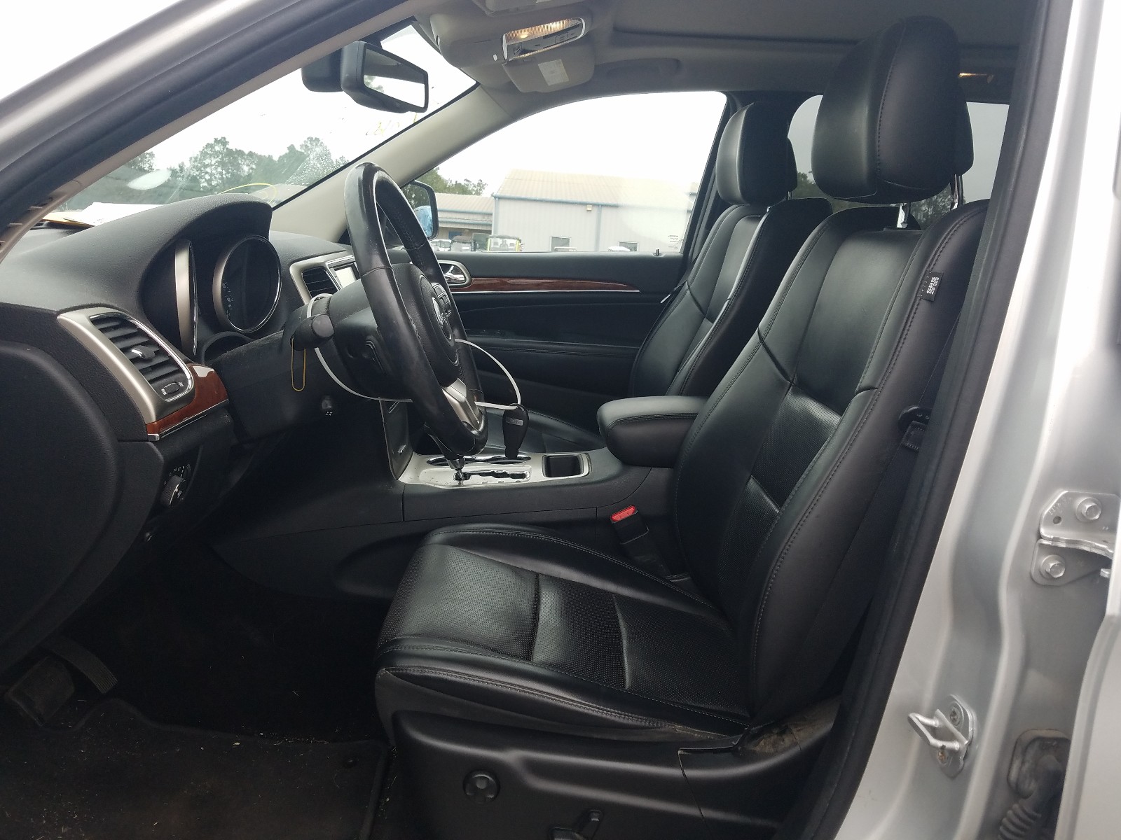 Photo 5 from auction – 2011 JEEP GRAND CHER with VIN 1J4RS5GG9BC557308