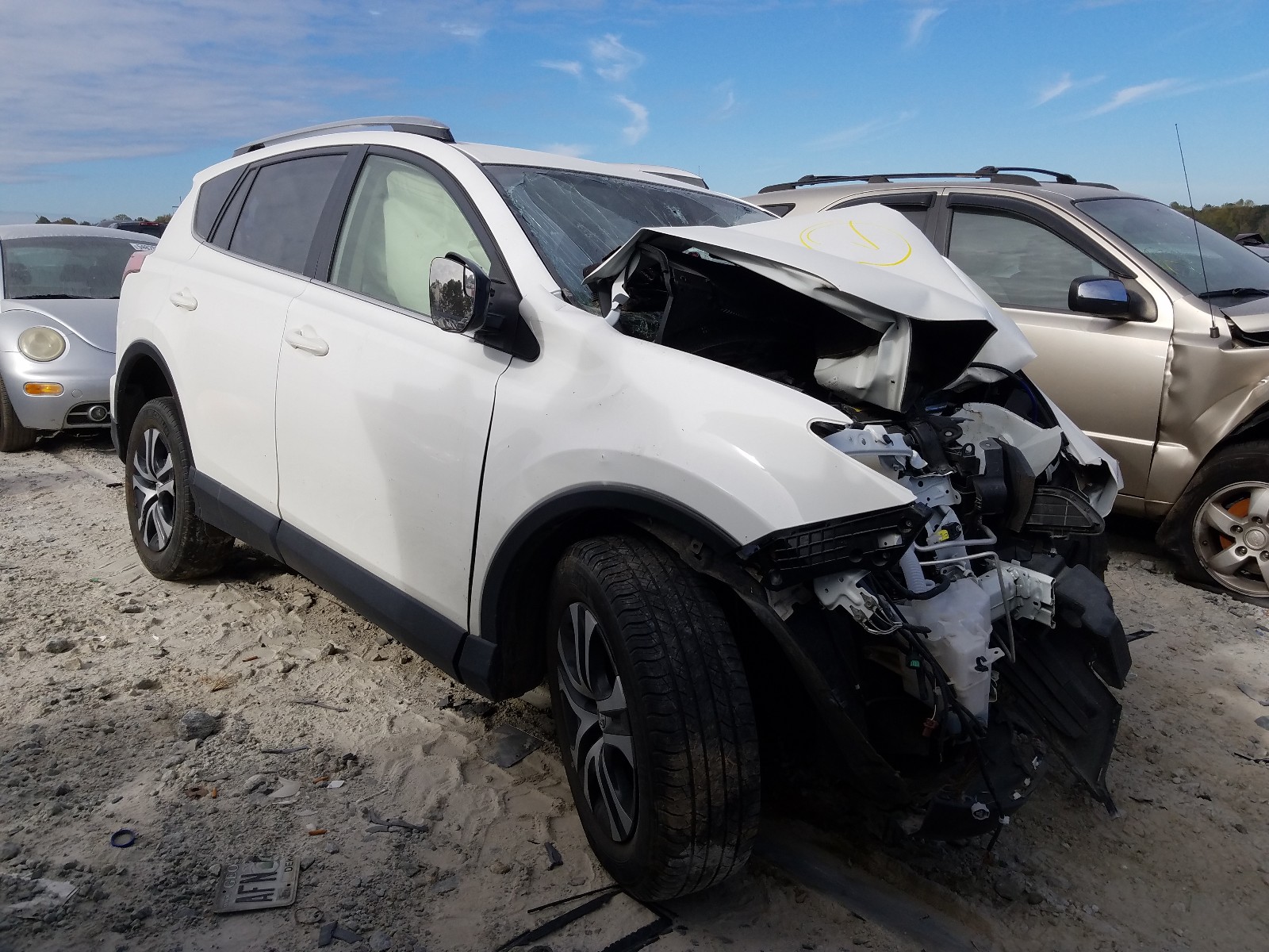 Photo 1 from auction – 2018 TOYOTA RAV4 LE with VIN JTMZFREV2JJ165574