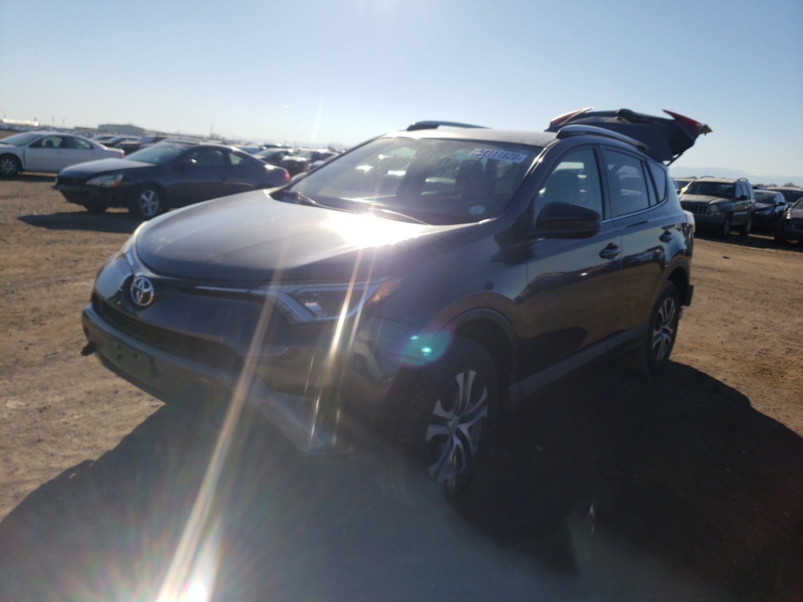Photo 2 from auction – 2016 TOYOTA RAV4 LE with VIN JTMBFREV8GJ067627