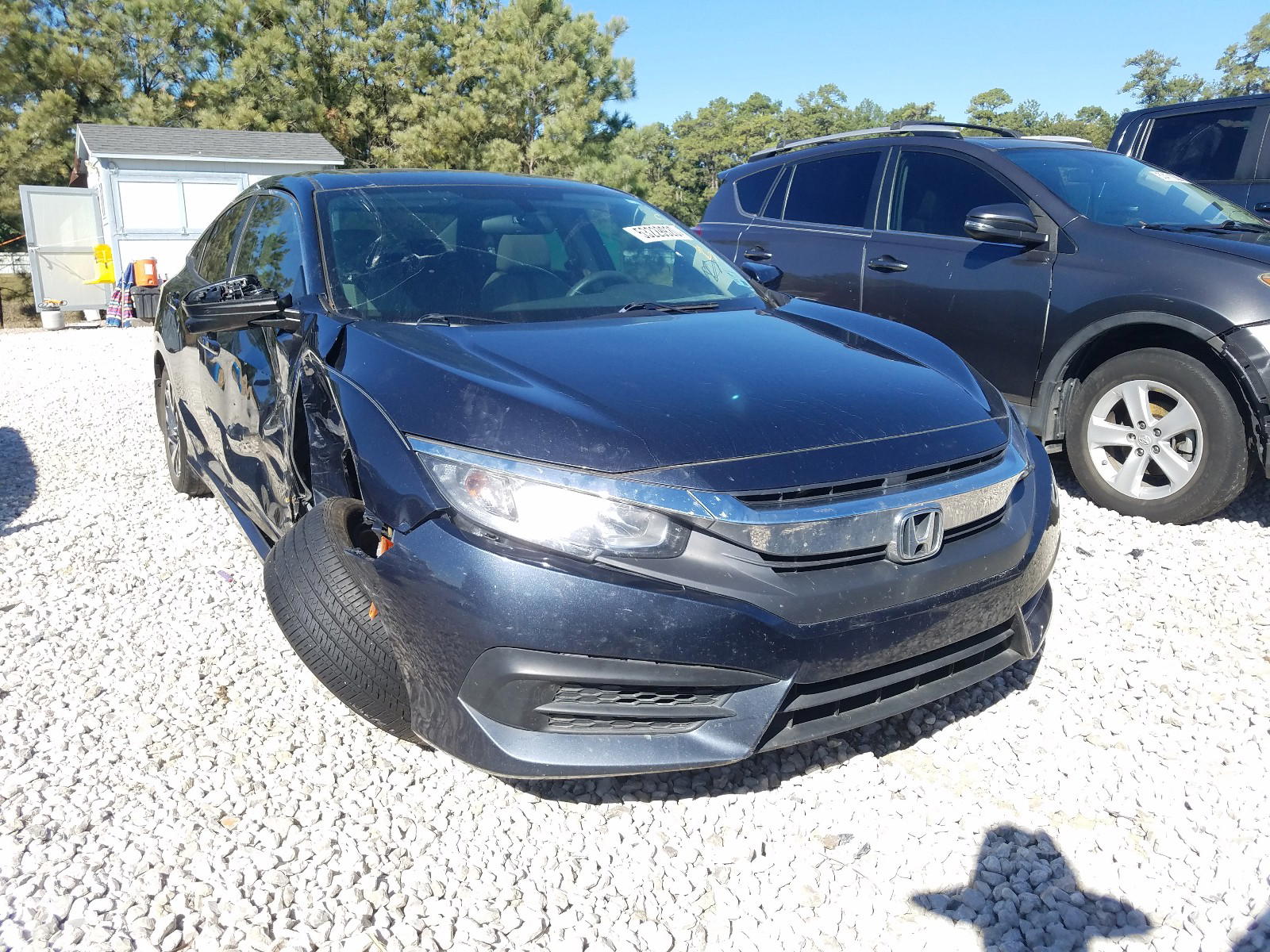 HONDA CIVIC EX 2017 with VIN 19XFC2F72HE051164 - Photo from auction