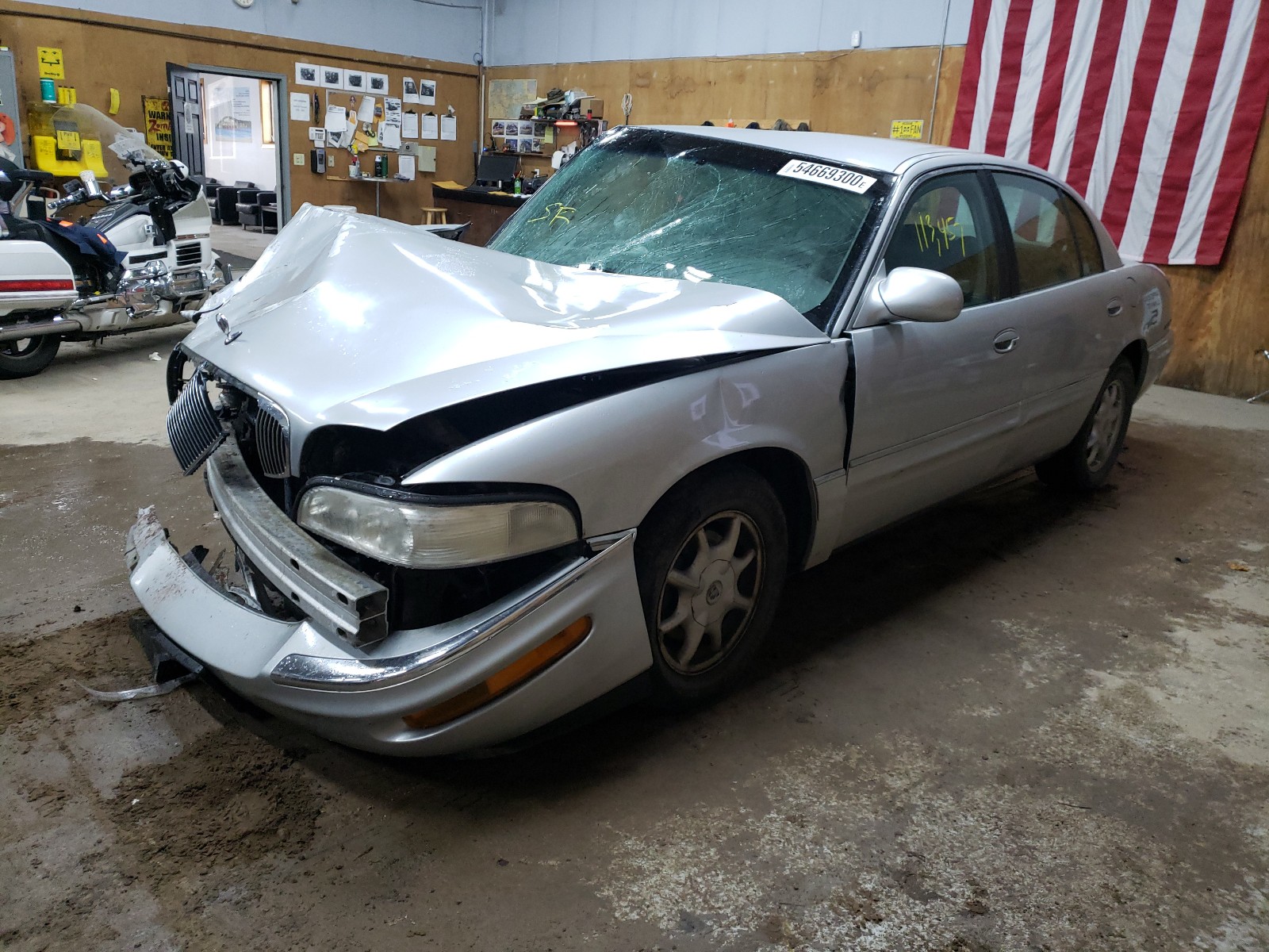 Photo 2 from auction – 2000 BUICK PARK AVENU with VIN 1G4CW54K6Y4290541