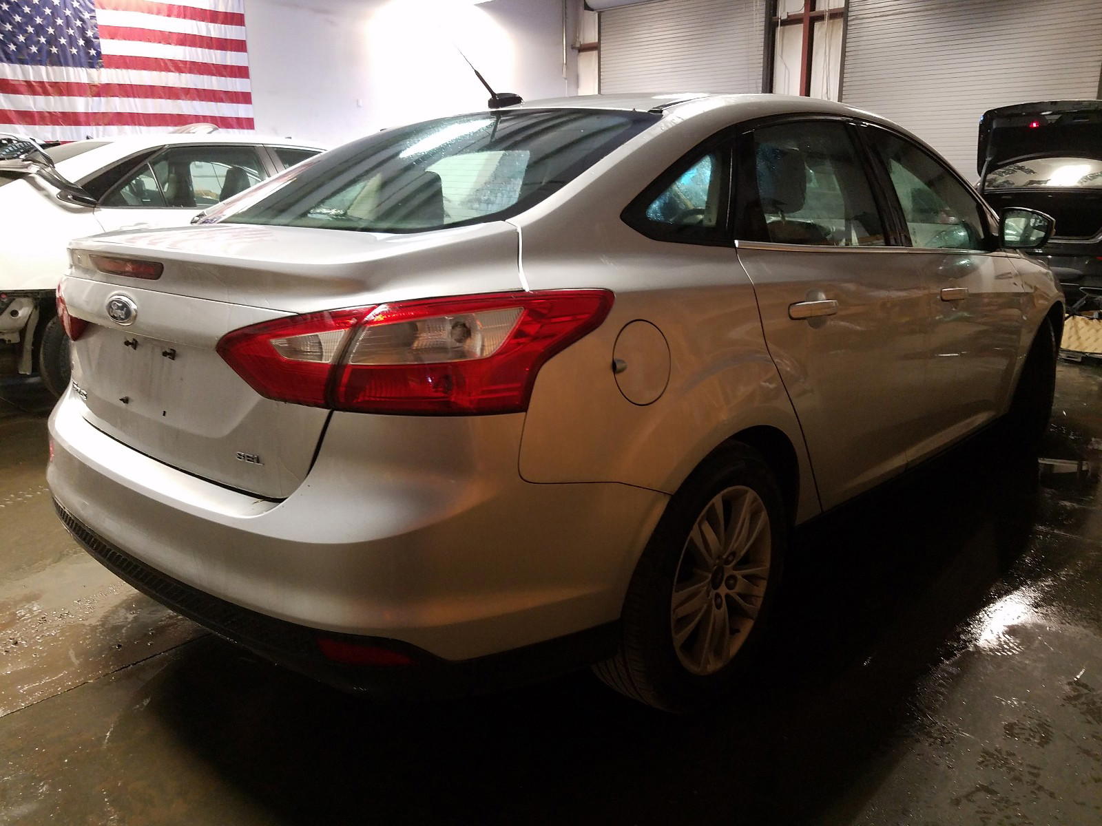Photo 4 from auction – 2012 FORD FOCUS SEL with VIN 1FAHP3H2XCL316133