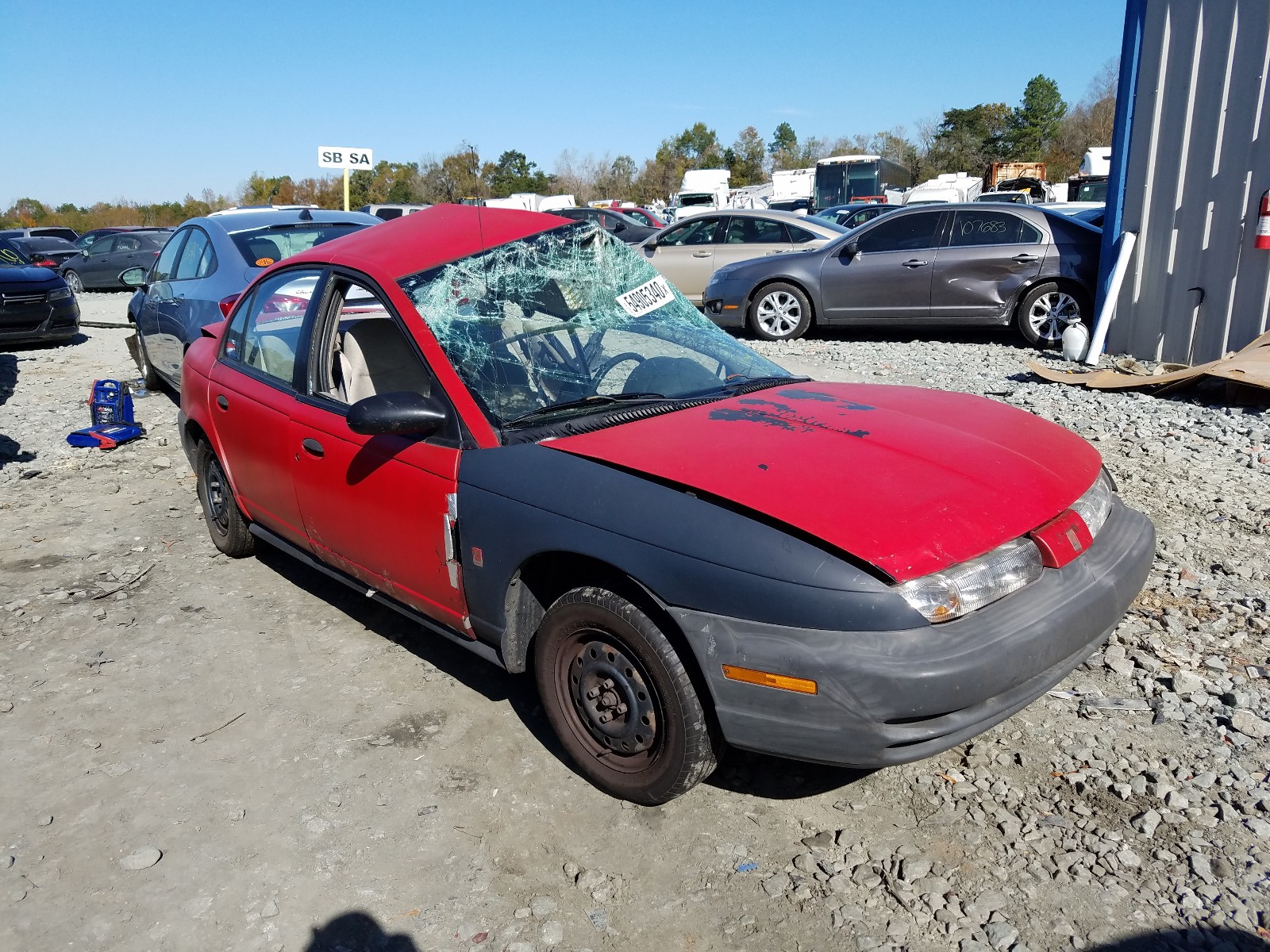 SATURN SL 1999 with VIN 1G8ZF5288XZ150671 - Photo from auction