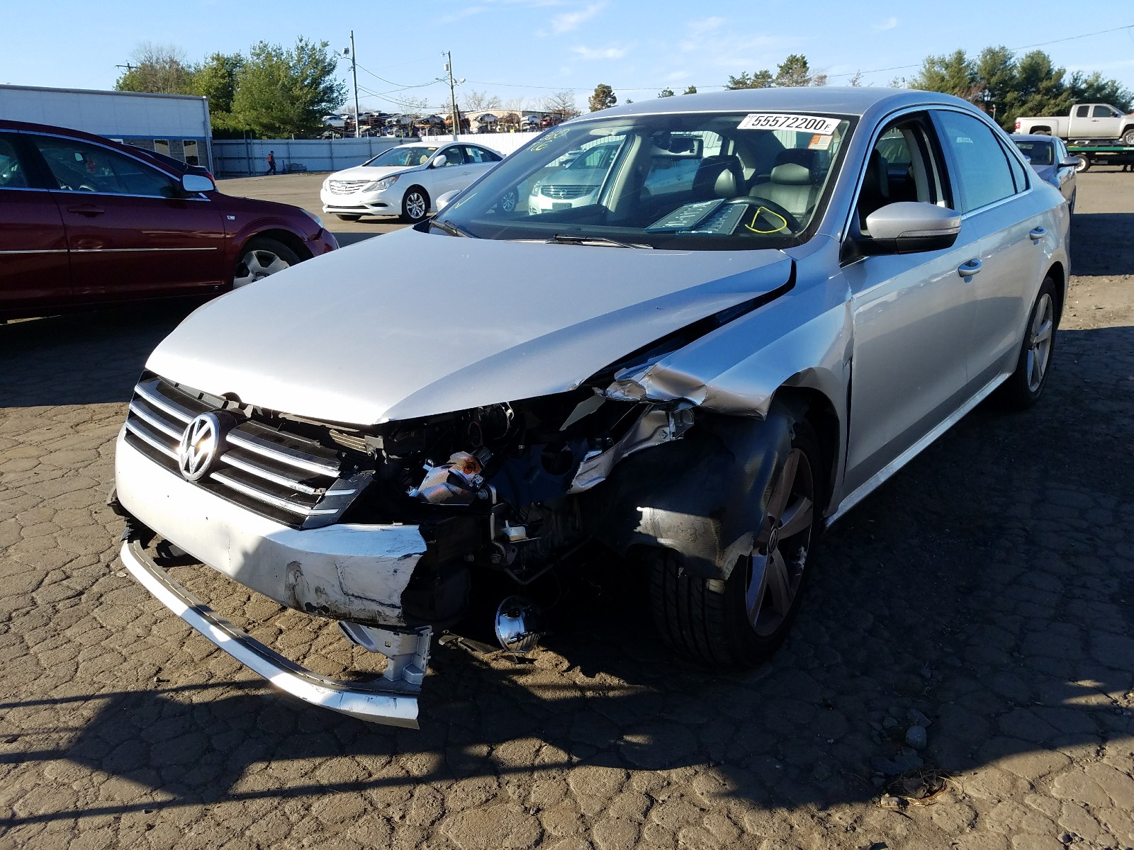 Photo 2 from auction – 2014 VOLKSWAGEN PASSAT SE with VIN 1VWBP7A34EC005128