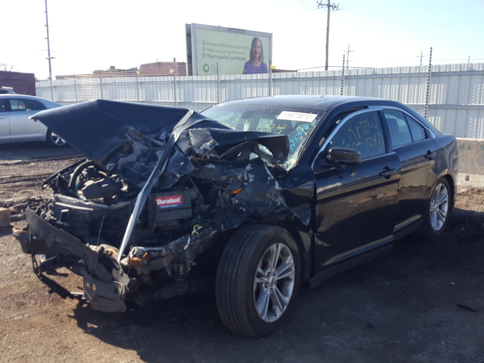Photo 2 from auction – 2015 FORD TAURUS SEL with VIN 1FAHP2E84FG208624