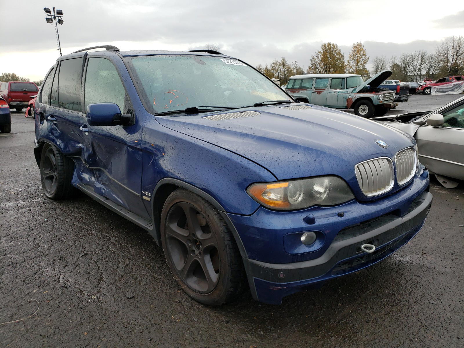 BMW X5 4.8IS 2005 with VIN 5UXFA93505LE82415 - Photo from auction