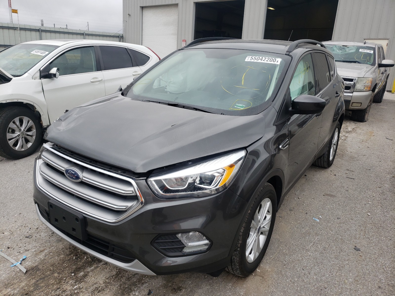 Photo 2 from auction – 2017 FORD ESCAPE SE with VIN 1FMCU0GD5HUD39105