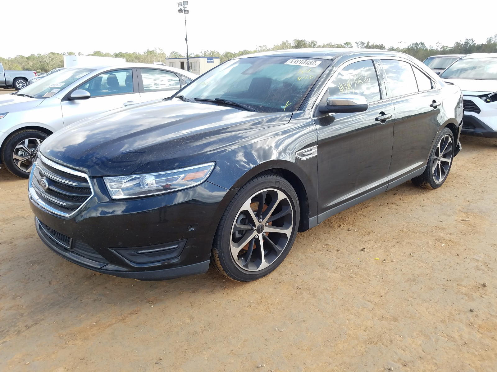 Photo 2 from auction – 2014 FORD TAURUS LIM with VIN 1FAHP2F8XEG184620