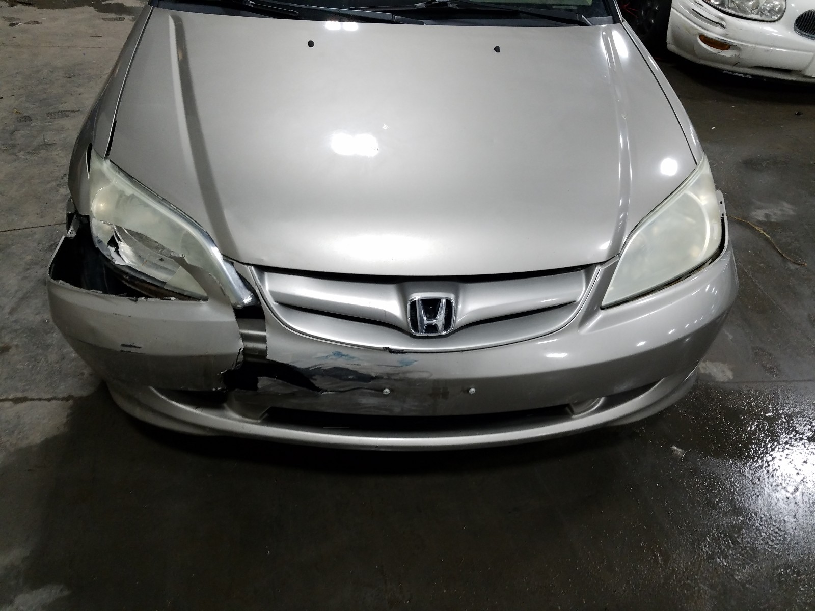 Photo 9 from auction – 2004 HONDA CIVIC LX with VIN 2HGES16634H636089