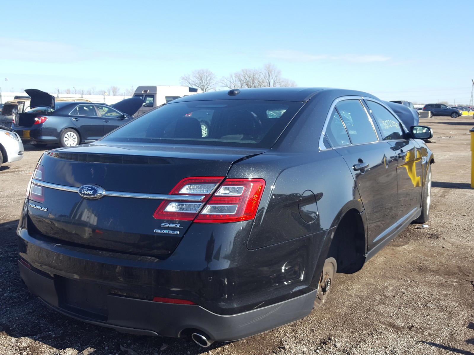 Photo 4 from auction – 2015 FORD TAURUS SEL with VIN 1FAHP2E84FG208624