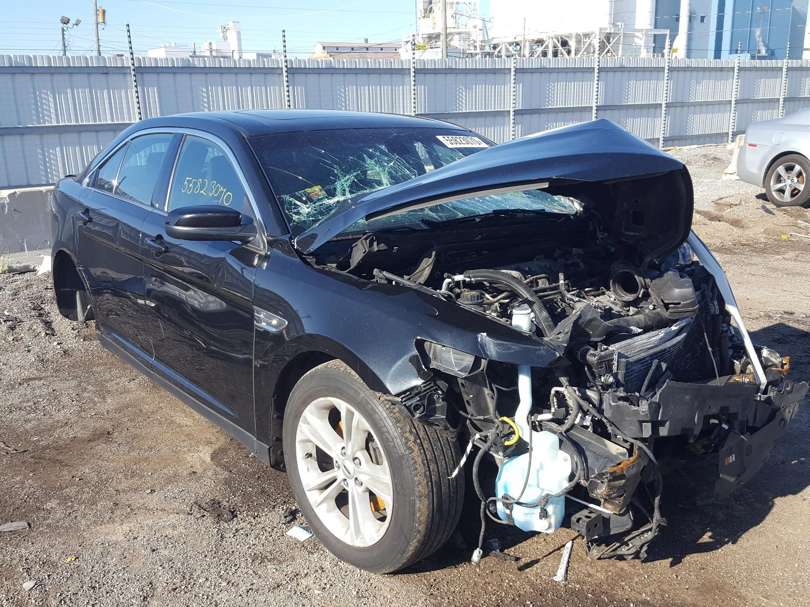 FORD TAURUS SEL 2015 with VIN 1FAHP2E84FG208624 - Photo from auction