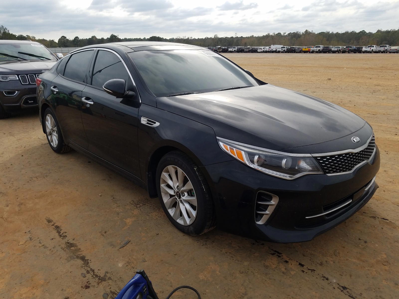 KIA OPTIMA EX 2017 with VIN 5XXGU4L33HG144068 - Photo from auction
