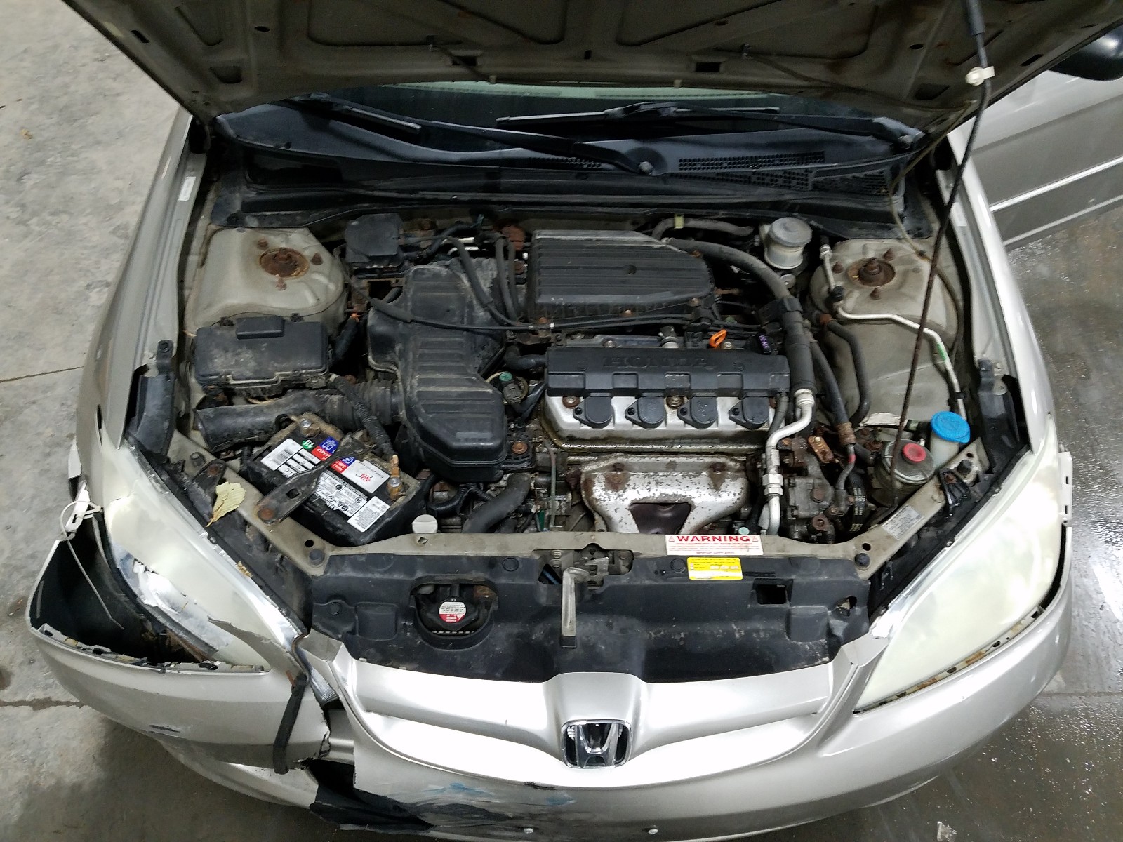 Photo 7 from auction – 2004 HONDA CIVIC LX with VIN 2HGES16634H636089