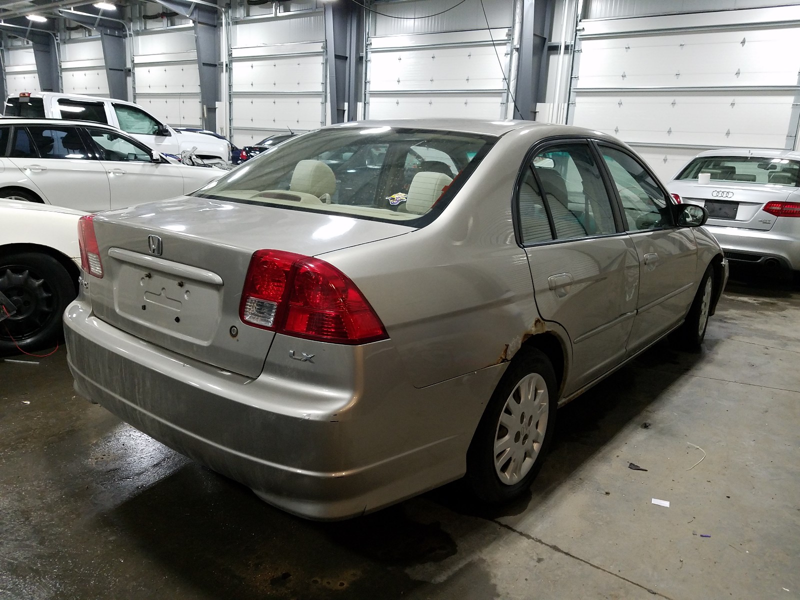 Photo 4 from auction – 2004 HONDA CIVIC LX with VIN 2HGES16634H636089