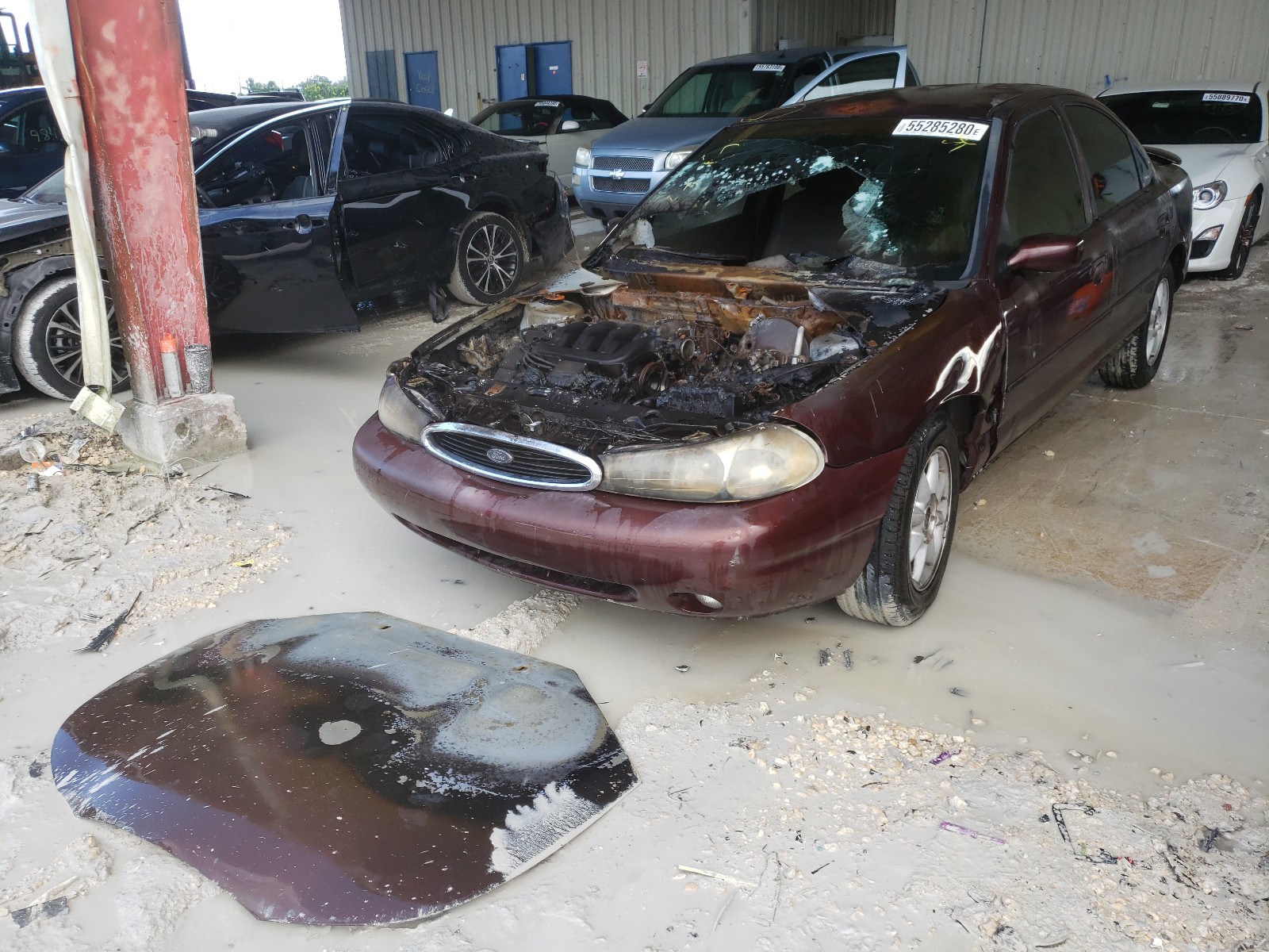Photo 2 from auction – 2000 FORD CONTOUR SE with VIN 1FAFP66L0YK137469