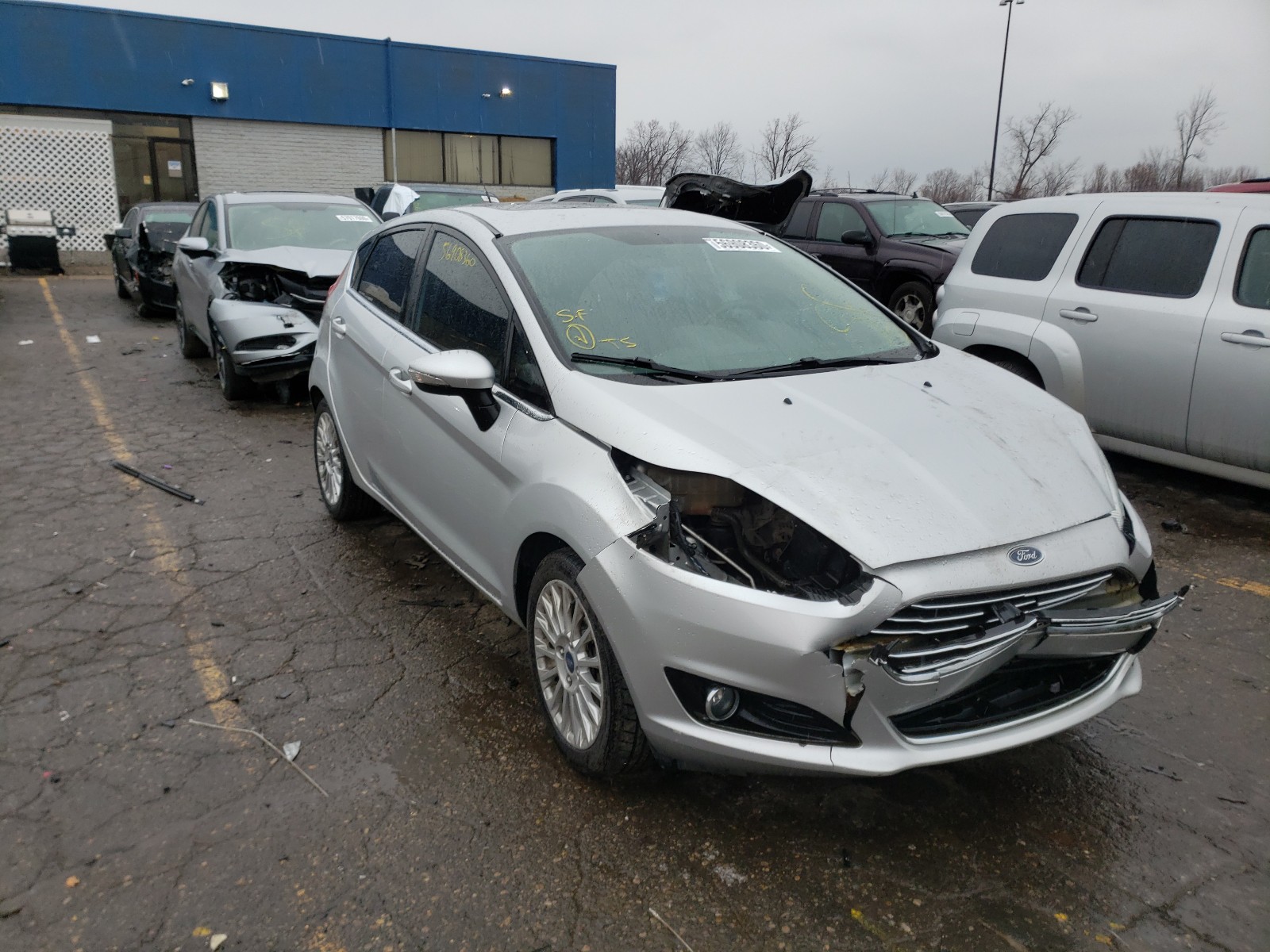 FORD FIESTA TIT 2014 with VIN 3FADP4FJ7EM165915 - Photo from auction