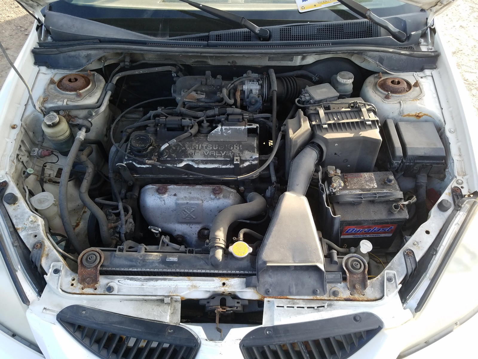 Photo 7 from auction – 2004 MITSUBISHI LANCER with VIN JA3AJ26E14U045400
