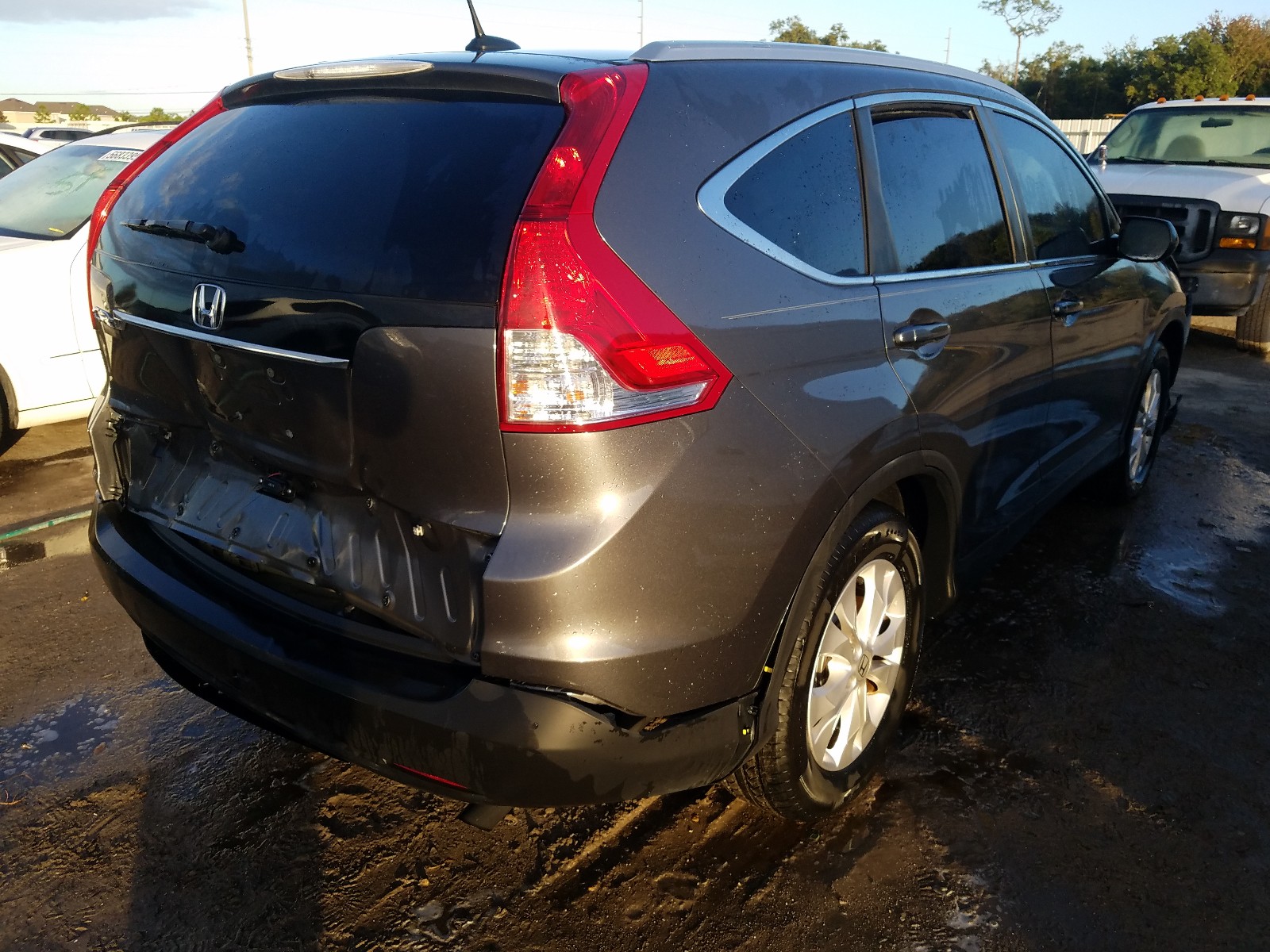 Photo 4 from auction – 2014 HONDA CR-V EXL with VIN 2HKRM3H78EH540382