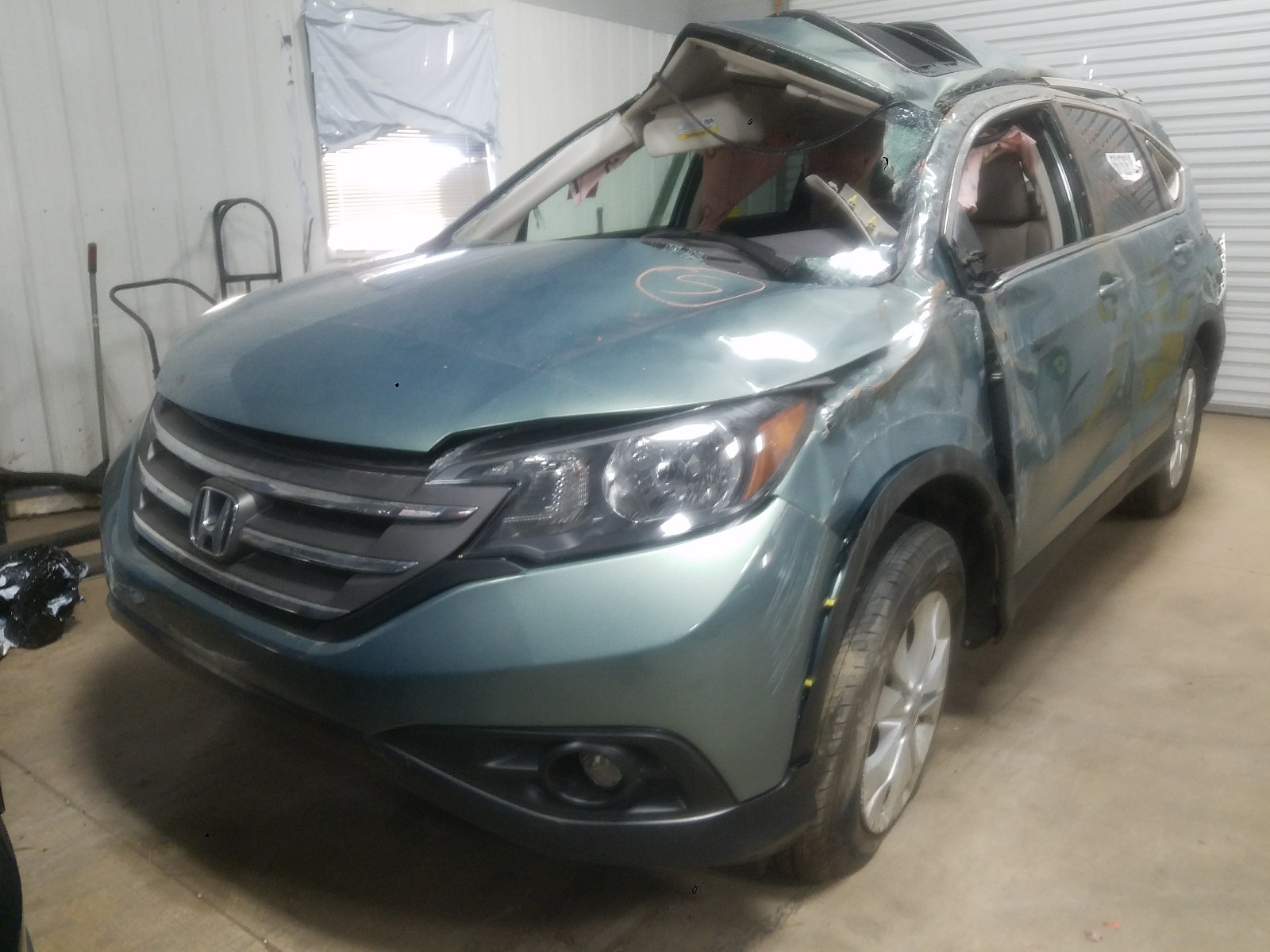 Photo 2 from auction – 2012 HONDA CR-V EXL with VIN 5J6RM4H77CL068703