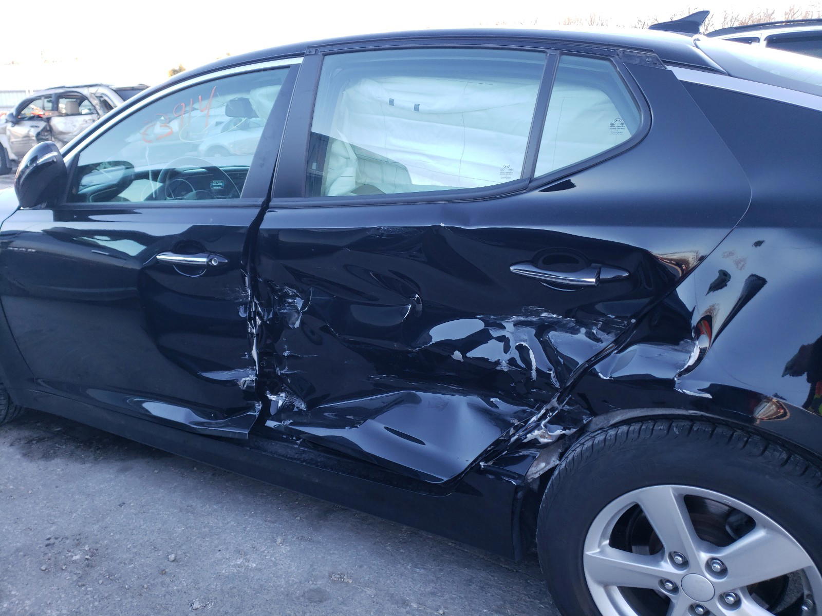 Photo 9 from auction – 2015 KIA OPTIMA with VIN 5XXGM4A72FG509794