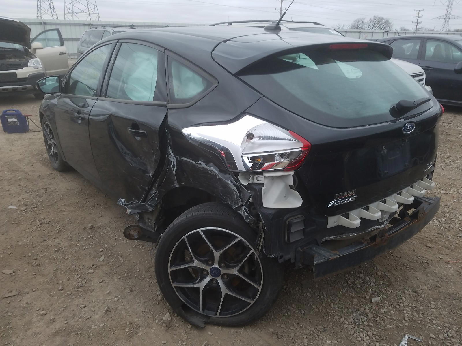 Photo 3 from auction – 2015 FORD FOCUS SE with VIN 1FADP3K2XFL253384