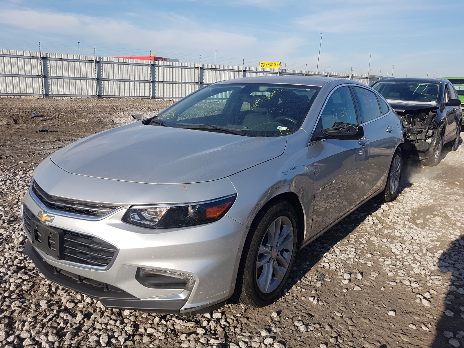Photo 2 from auction – 2017 CHEVROLET MALIBU LT with VIN 1G1ZE5ST0HF272255