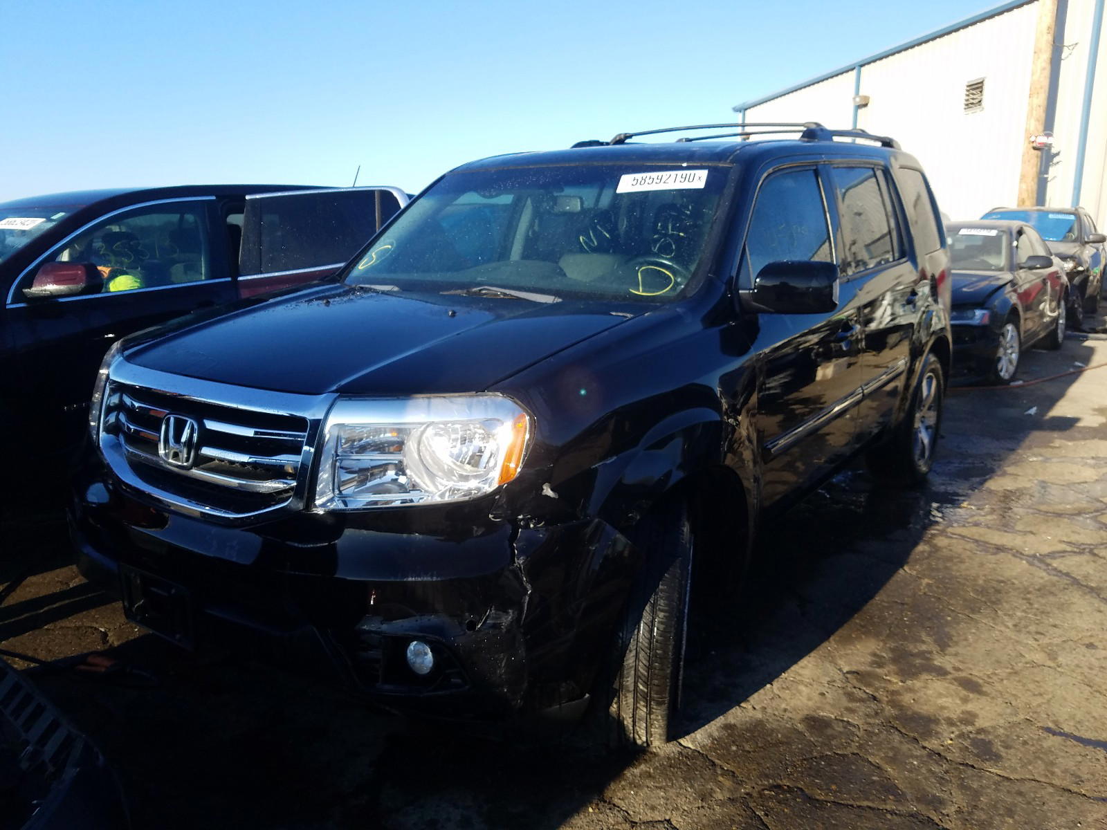 Photo 2 from auction – 2014 HONDA PILOT TOUR with VIN 5FNYF3H92EB026436