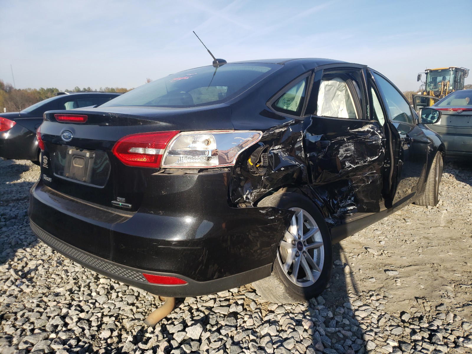 Photo 4 from auction – 2015 FORD FOCUS SE with VIN 1FADP3F22FL207204