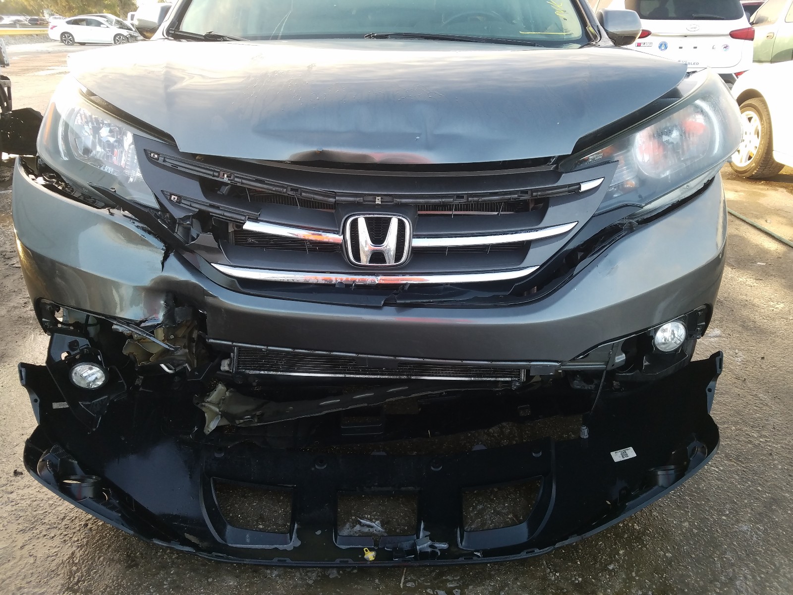 Photo 9 from auction – 2014 HONDA CR-V EXL with VIN 2HKRM3H78EH540382