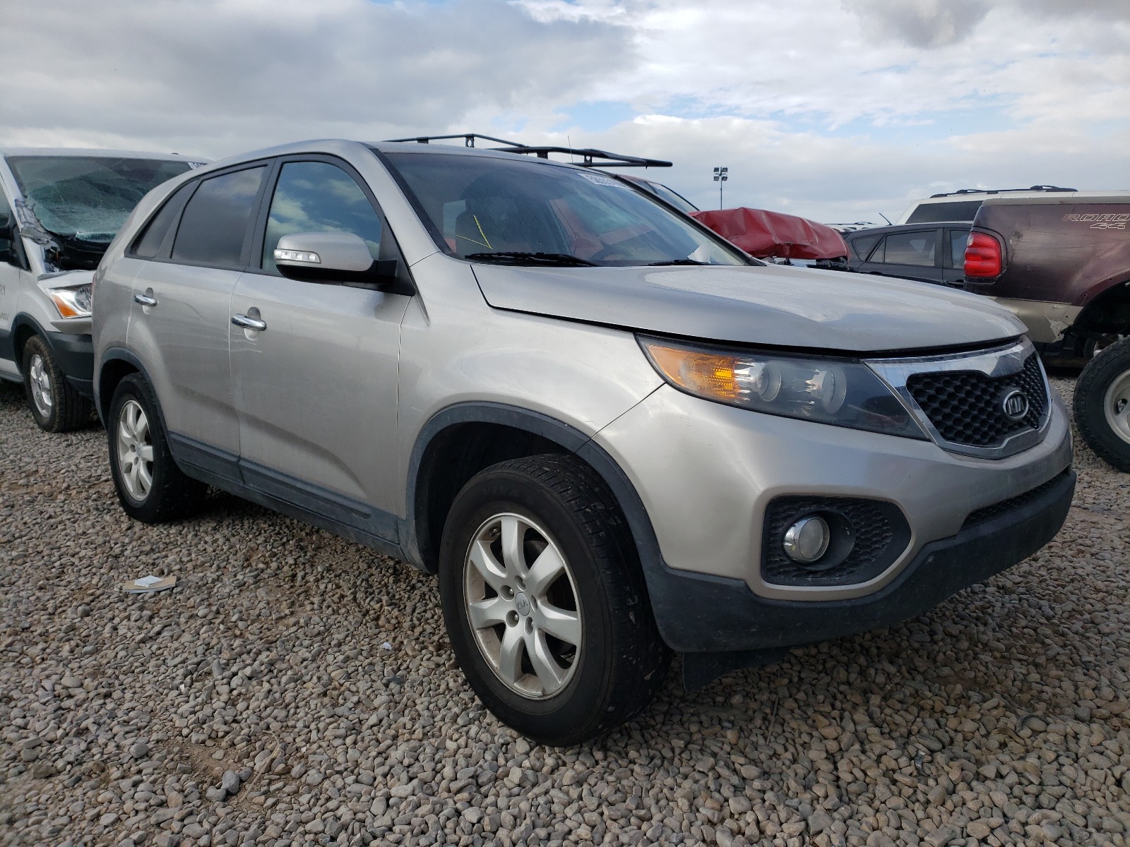 KIA SORENTO LX 2013 with VIN 5XYKT3A15DG419969 - Photo from auction