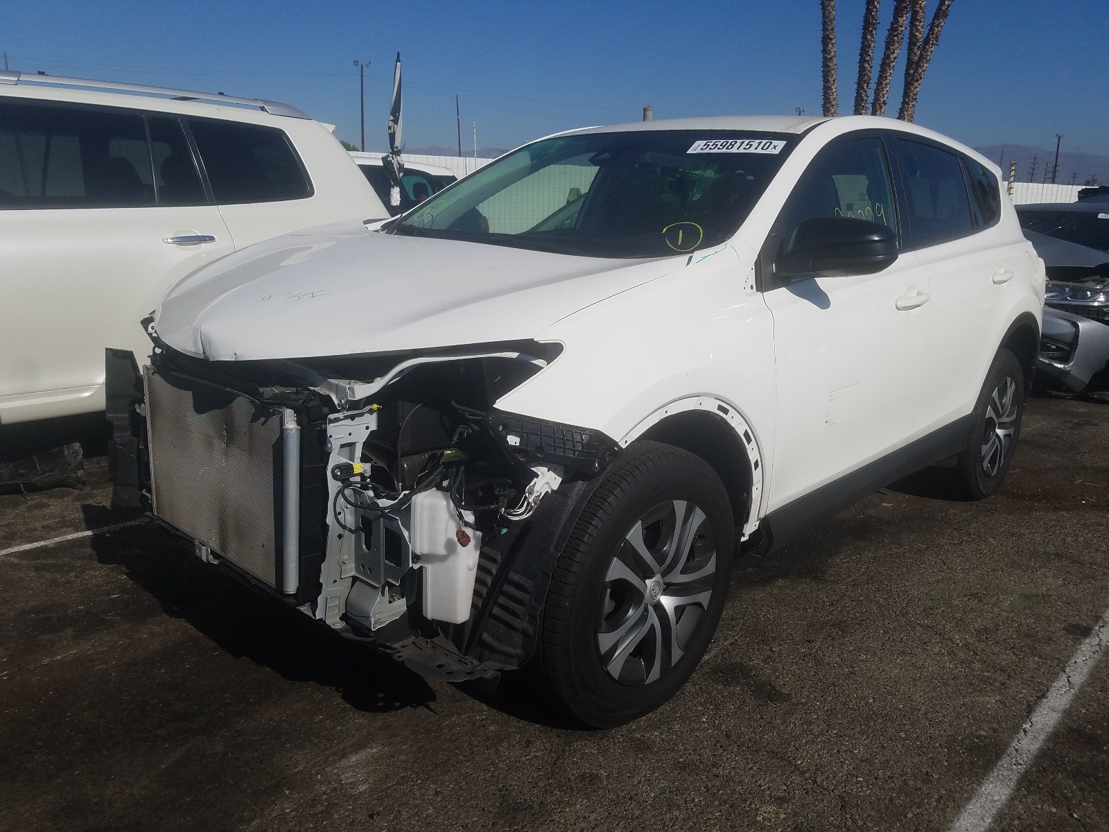 Photo 2 from auction – 2018 TOYOTA RAV4 LE with VIN JTMZFREV0JJ735930