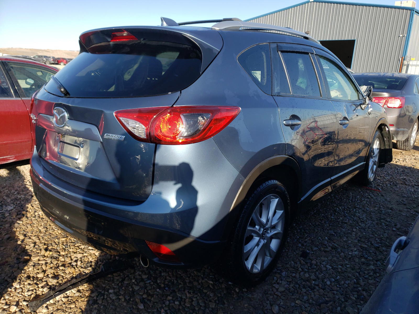 Photo 4 from auction – 2015 MAZDA CX-5 GT with VIN JM3KE4DY3F0446872