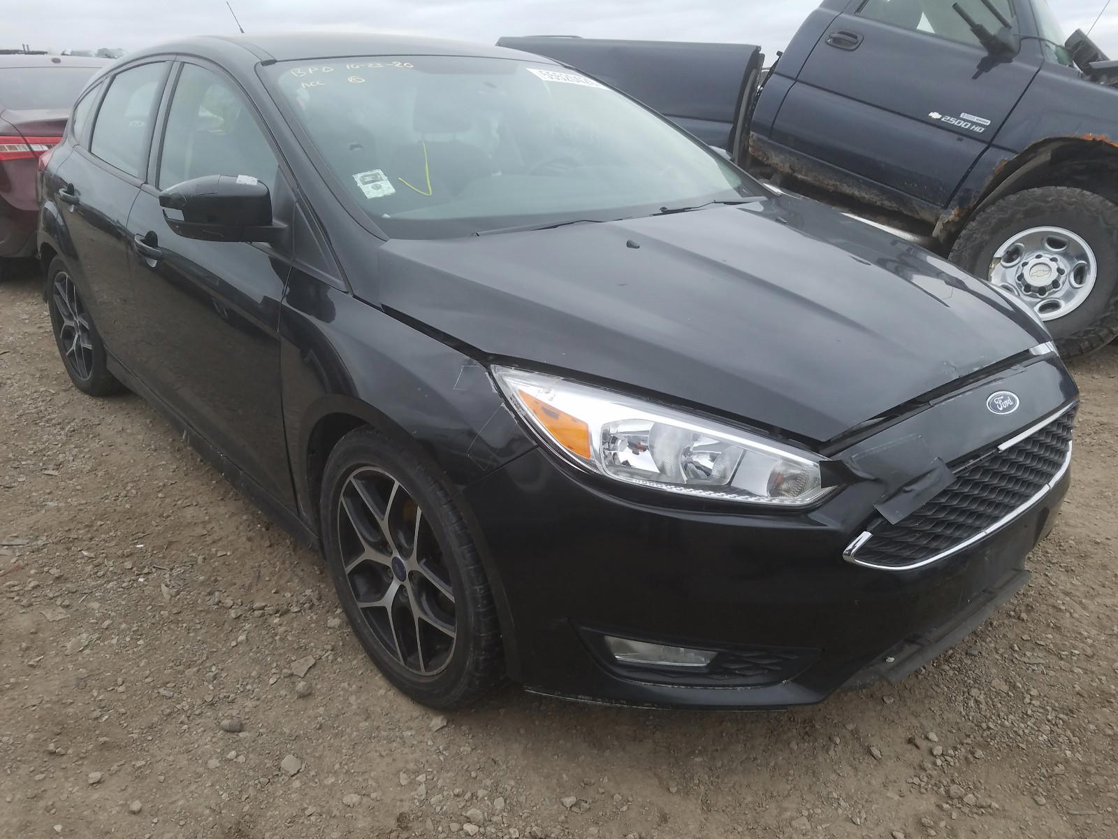 FORD FOCUS SE 2015 with VIN 1FADP3K2XFL253384 - Photo from auction