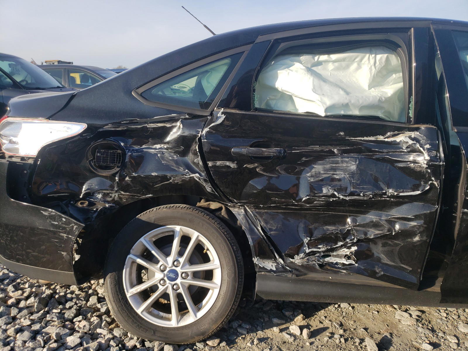 Photo 9 from auction – 2015 FORD FOCUS SE with VIN 1FADP3F22FL207204